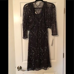 Patra slate sequined dress with matching jacket.